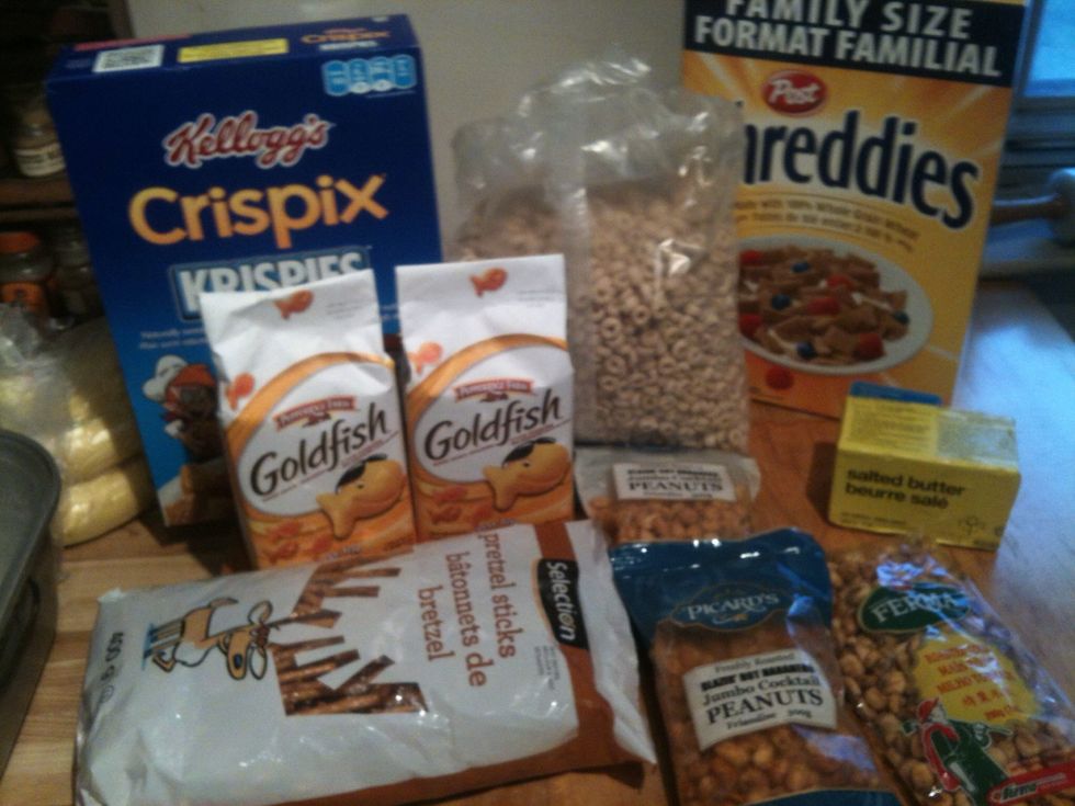 Ingredients. I used blazing hot peanuts for some extra spice. Honey nut Cheerios for a little sweetness in the mixture. I also break the pretzel sticks in half.