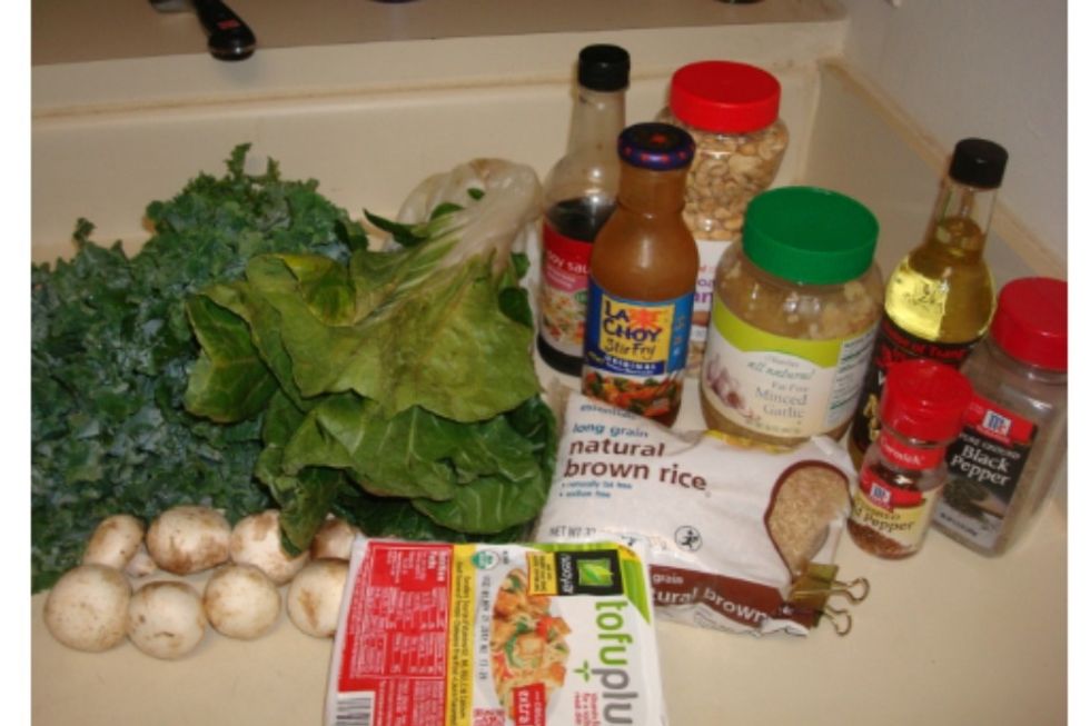 Ingredients: Kale, Bok Choy, Tofu, Mushrooms, Brown Rice, Garlic, Peanuts, Stir Fry Sauce, Spices