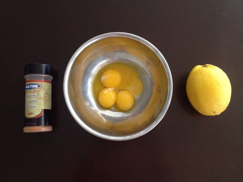 Ingredients: lemon juice, Cheyenne pepper, 4 egg yolks (oops one broke) and one stick melted butter.