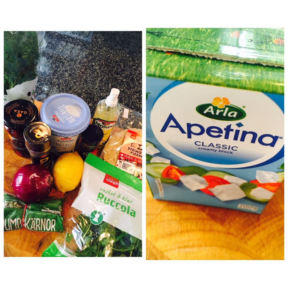 Ingredients: olive oil, feta cheese, kalamata olives, lemon, mini wholewheat Italian pizza crusts, pepper, salt, yoghurt (non-flavoured)To serve/optional: pumpkin seeds, chopped red onion and rocket.