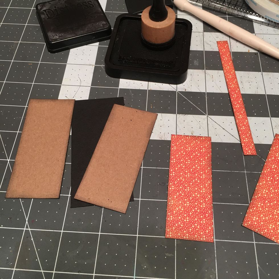 Ink all the papers you've already cut for the closure piece. Note: you should have two pieces of the patterned paper pre-cut for the closure. (One is not shown in photo.)