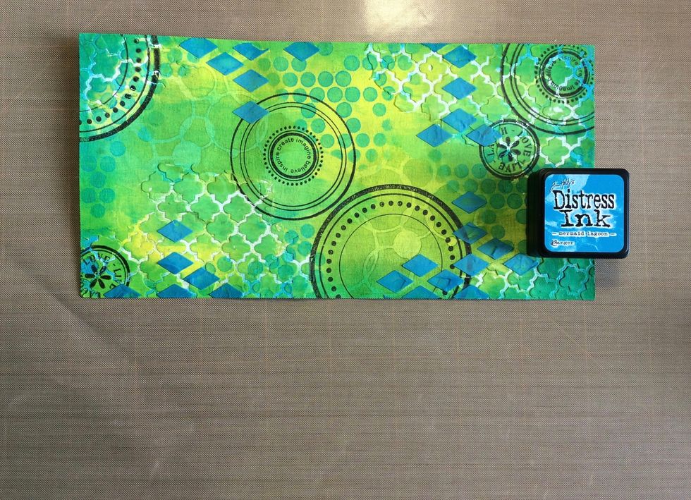 Ink around edges with coordinating ink. I used distress in mermaid lagoon.