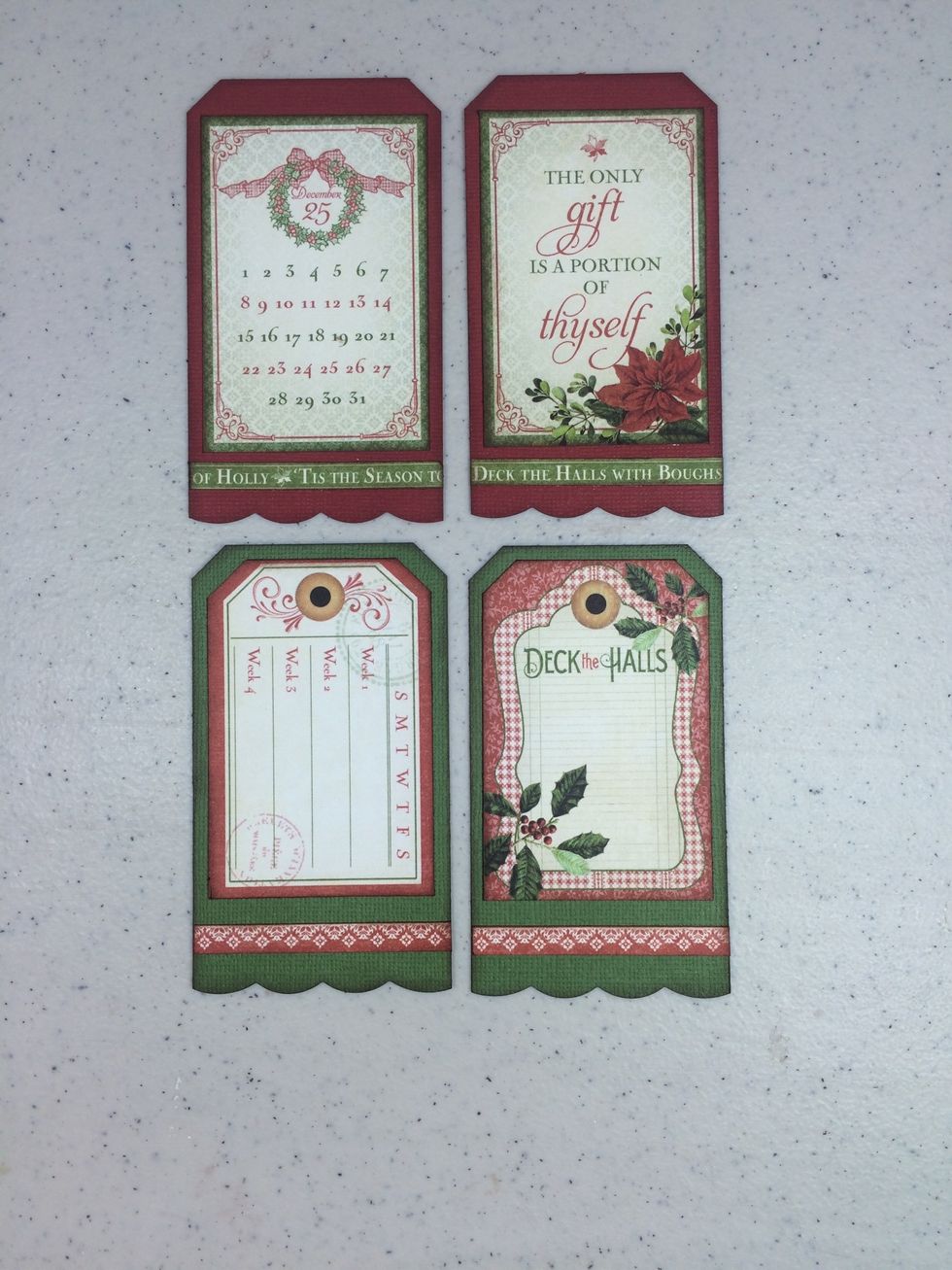 Ink edges and adhere the four cut-apart pieces and the thin strips to their coordinating tags, as shown.