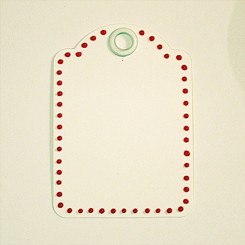 Ink edges of ATC, then apply liquid pearls around the edges of the card as shown. Allow to dry.