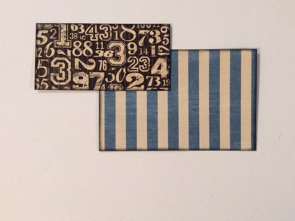 Ink edges of patterned paper mats with black soot distress ink.