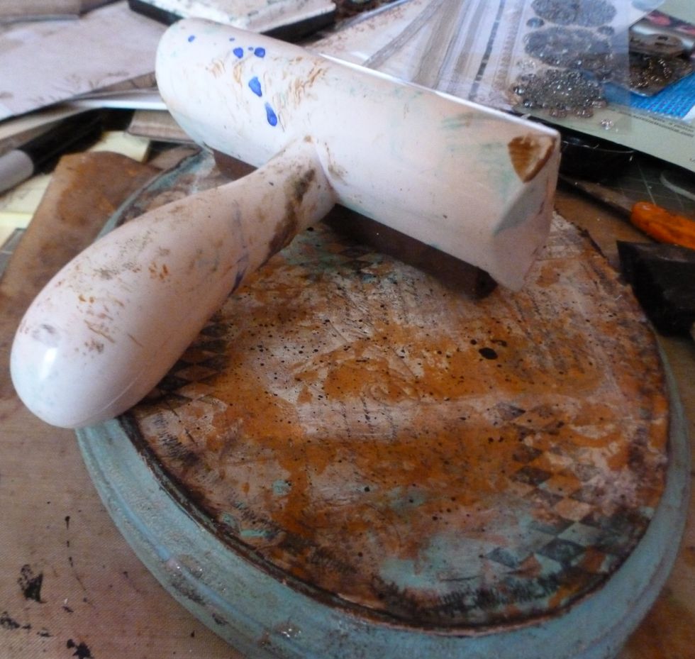 Ink edges of the paper. Then using Ranger multi medium matte, adhere paper to the plaque. Use a brayer to burnish. This will help eliminate air bubbles. Once dry, add a top coat.