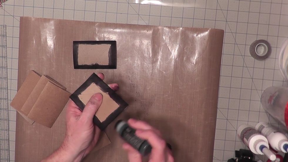 Ink or stain the edges of all the tubes including the piece you trimmed down for the spine piece.