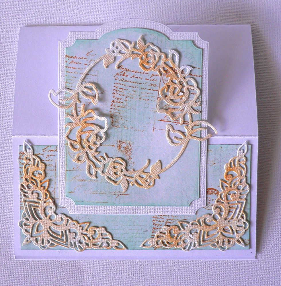 Ink Rosey Frame die cut and Corner frames die cut with Rustic Hinge ink pad, Adhere to card as shown.