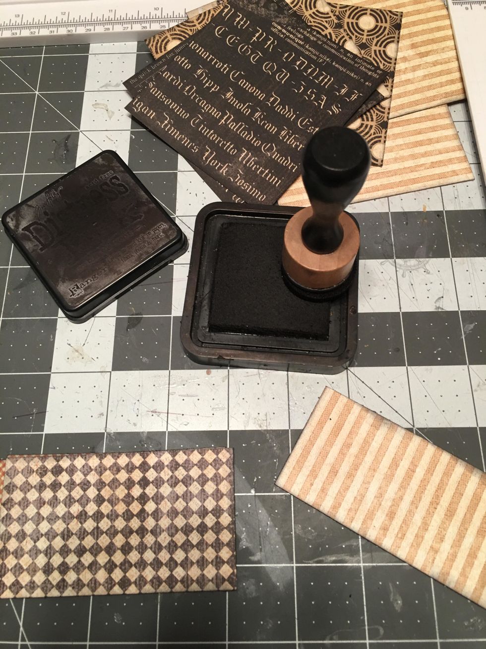 Ink the edges of all the papers with Black Soot Distress Ink.