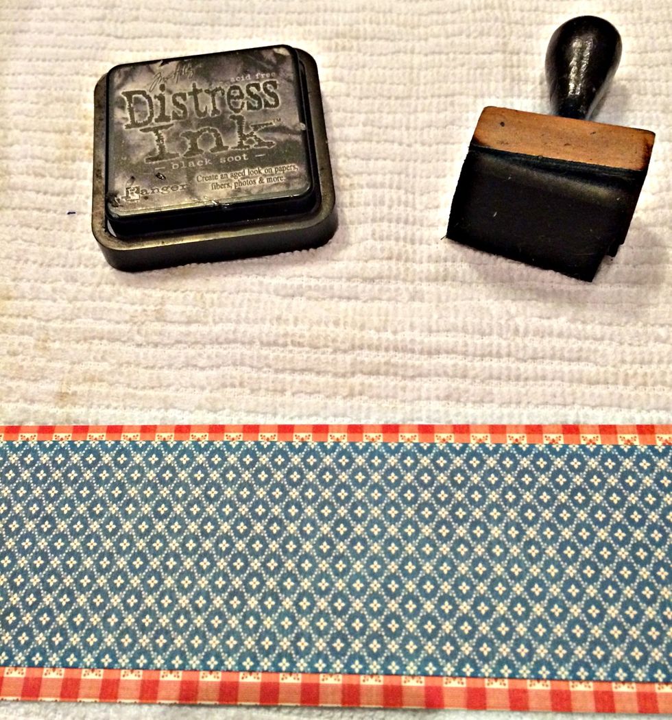 Ink the edges of both pieces of cardstock. Glue the smaller piece on top of the larger one. Leaving a slight border on the top and bottom.