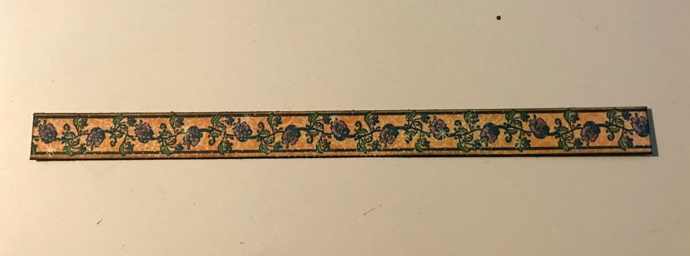 Ink the edges of the left over floral border piece with Photogenic Ink and a blending tool with foam.