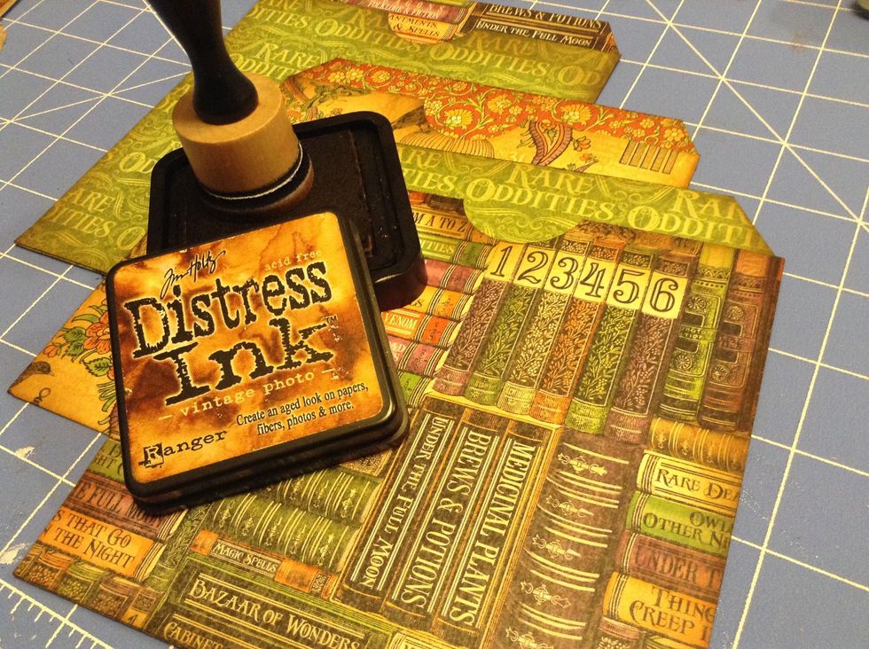 Ink the edges with Tim Holtz Vintage Photo Distress Ink. You can find this at www.FotoBella.com