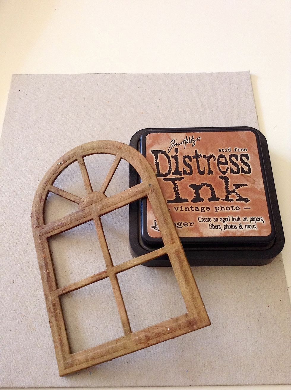 Ink the window with distress ink of your choice, vintage photo is used here.