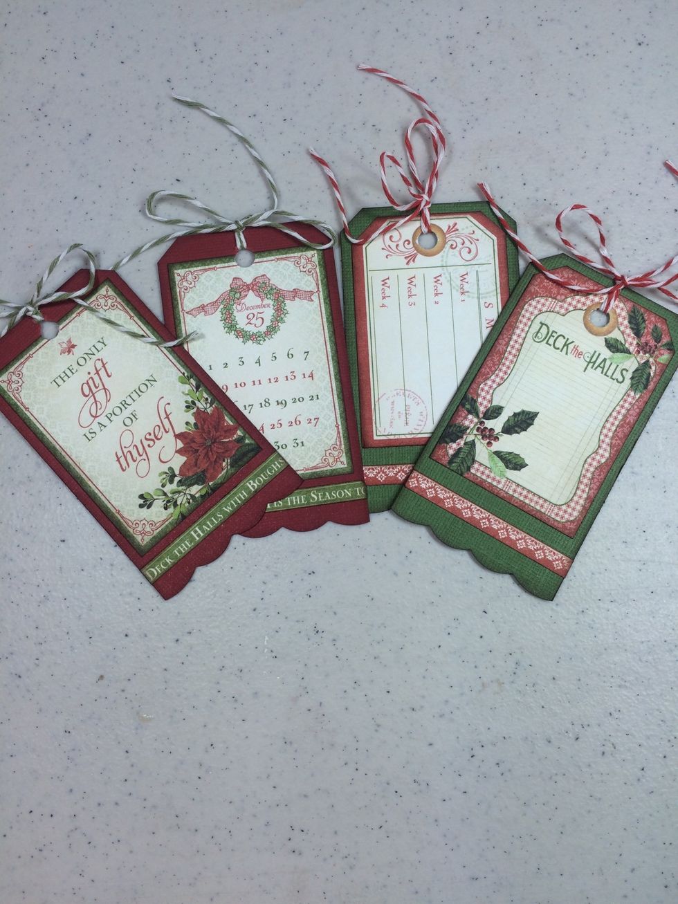 Insert 12" lengths of bakers twine into each and tie bows. Done!