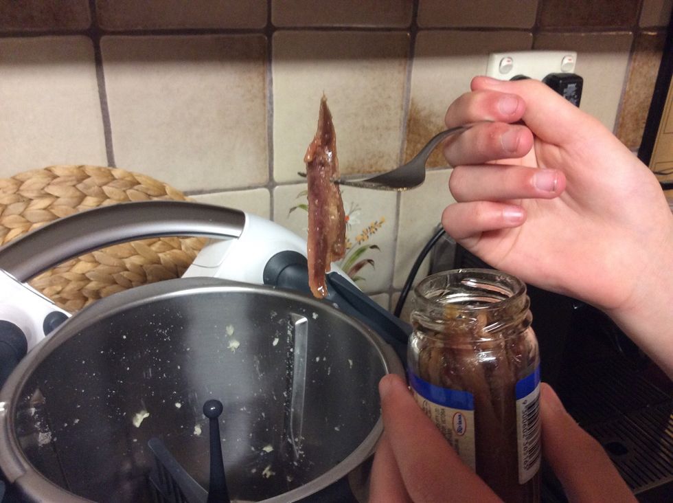 Insert butterfly whisk and add 3 anchovies