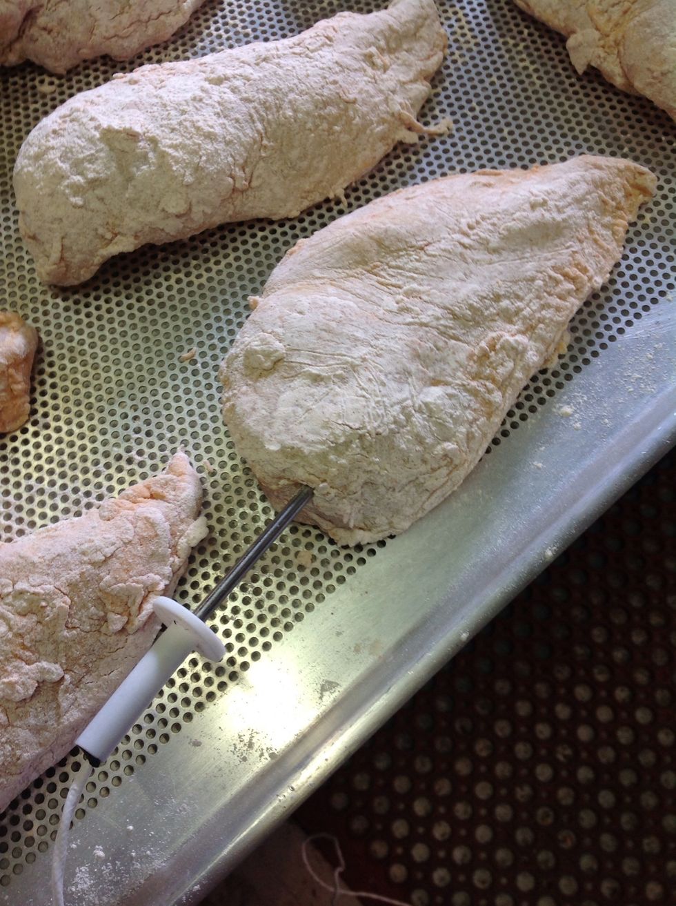 Insert core-temperature probe into center of chicken.