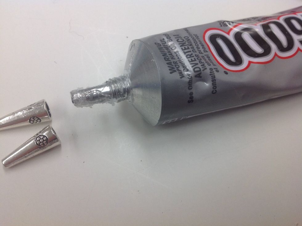 Insert E6000 adhesive into bead cones and let cure for about 2 minutes.