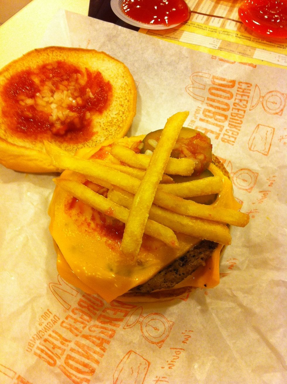 Insert fries. On top of cheese.