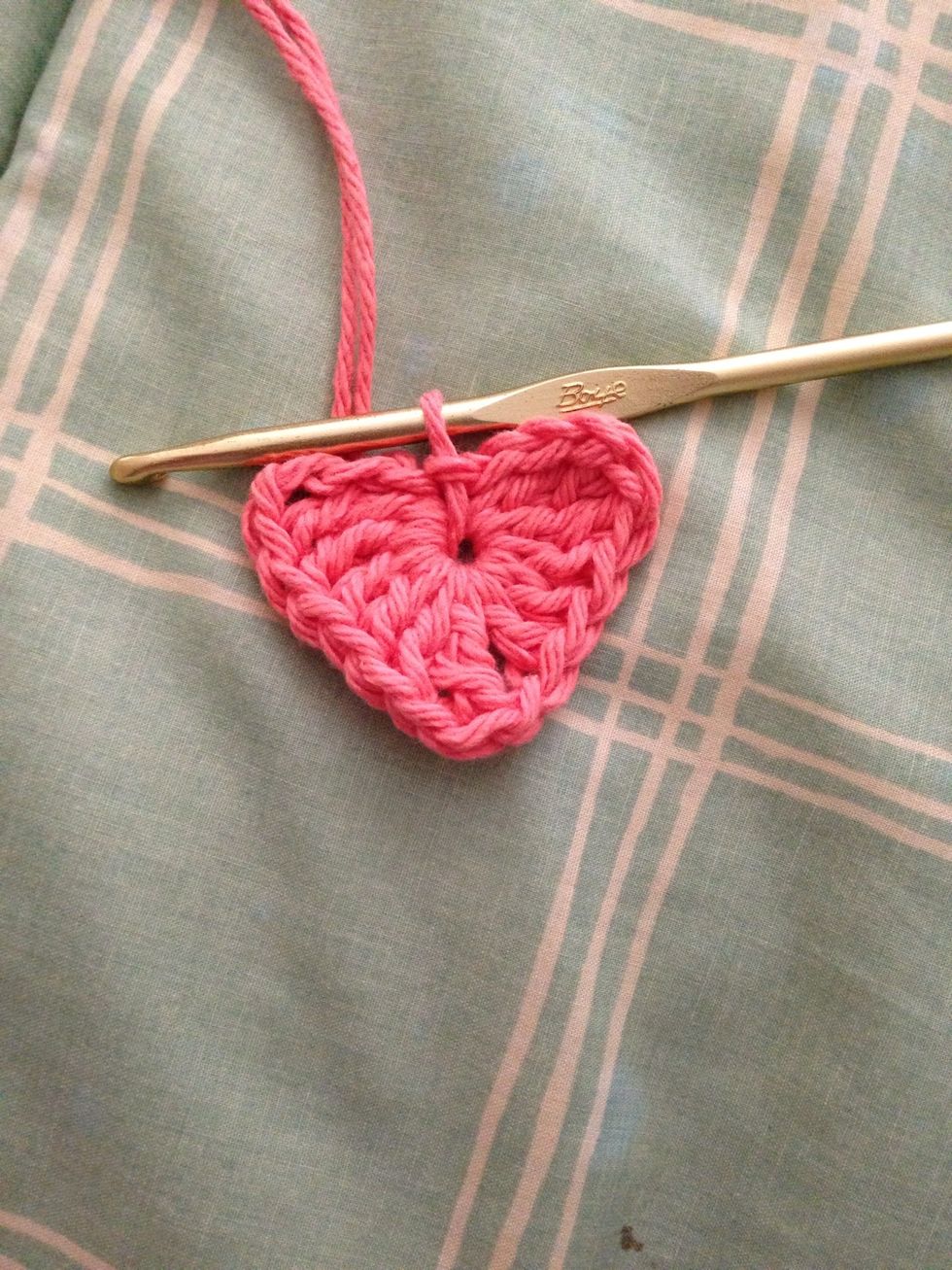 Insert hook into center of heart and make a slip knot to finish up the heart.