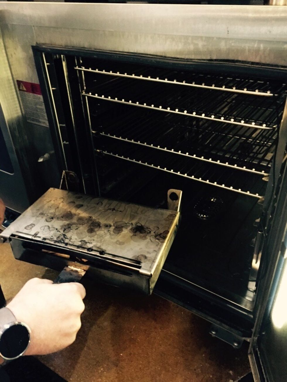 Insert smoker box into the oven.
