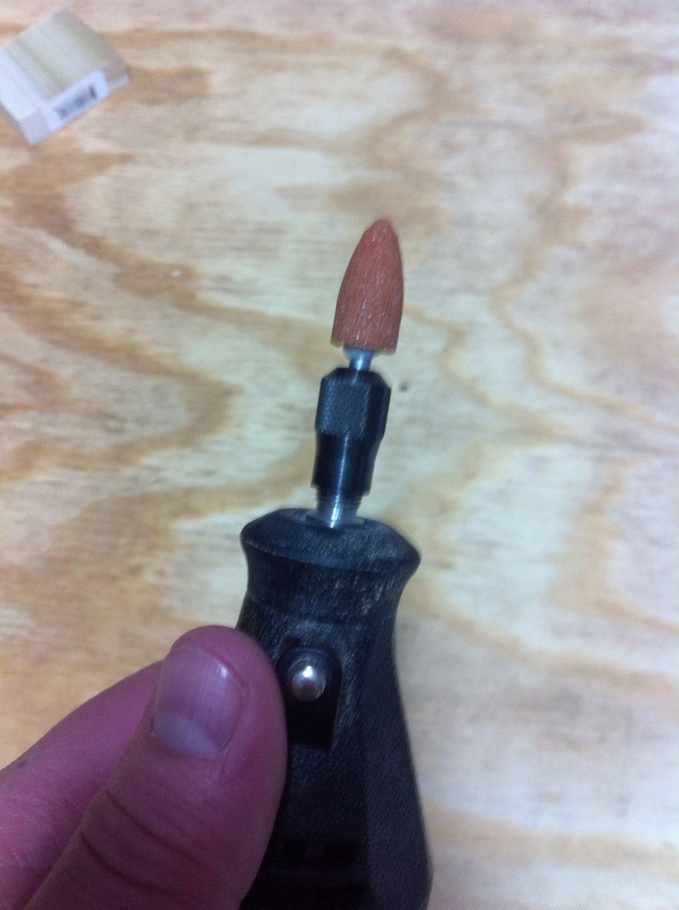 Insert the attachment and start to tighten.