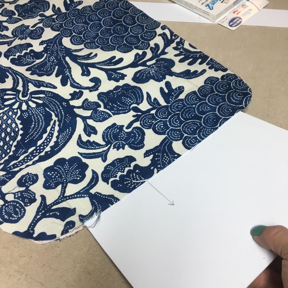 Insert the basket bottom into the pocket.