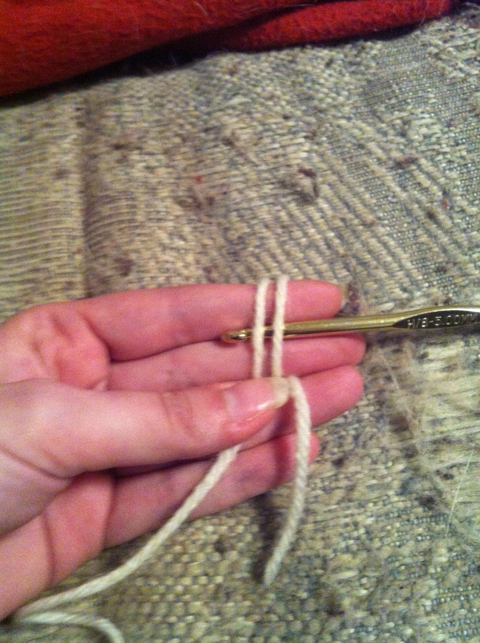 insert the hook under both loops