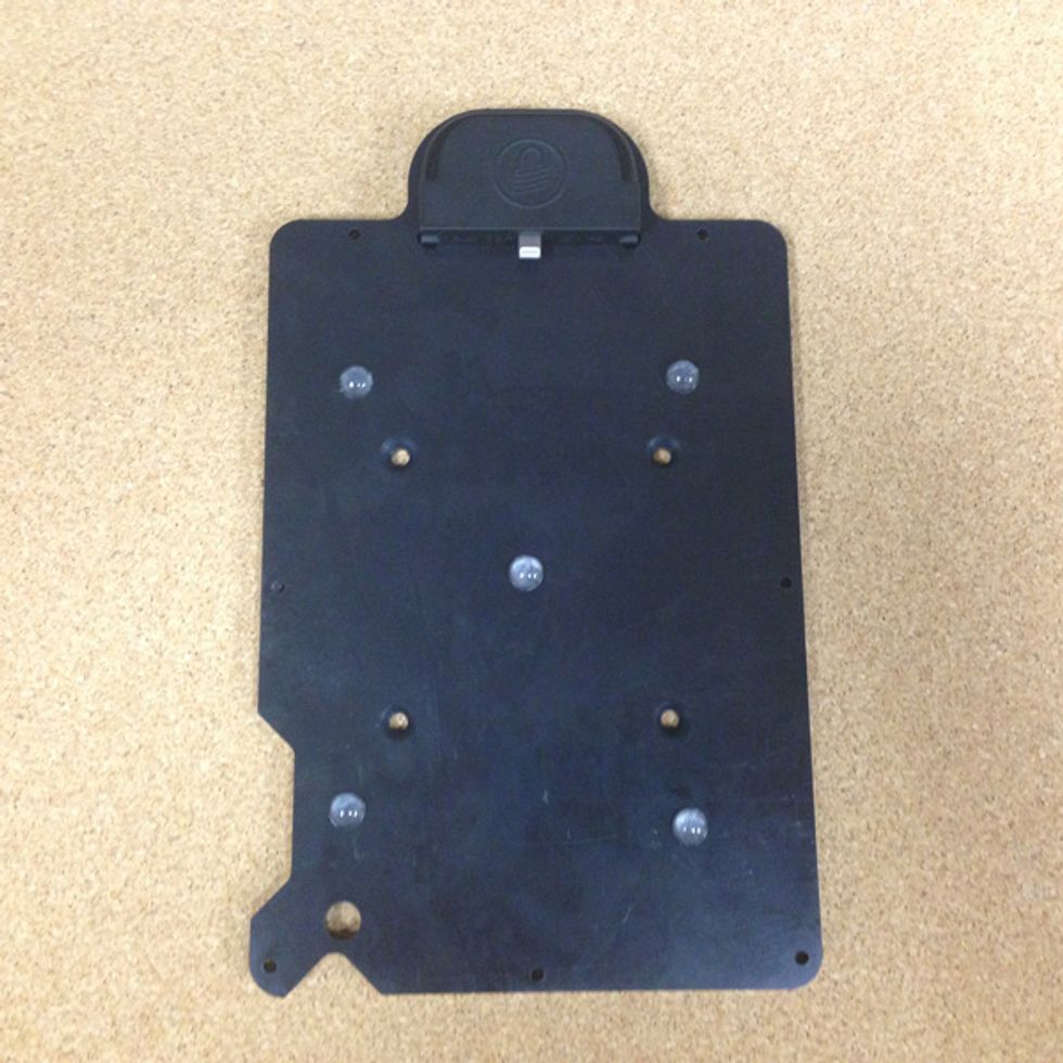 Insert the MAGTEK iDynamo5 in to the back plate pocket. It will be a snap fit.