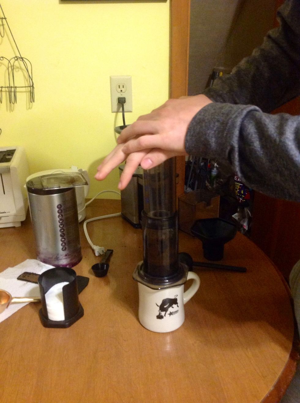 Insert the press into the cylinder and apply pressure until it reaches the bottom.