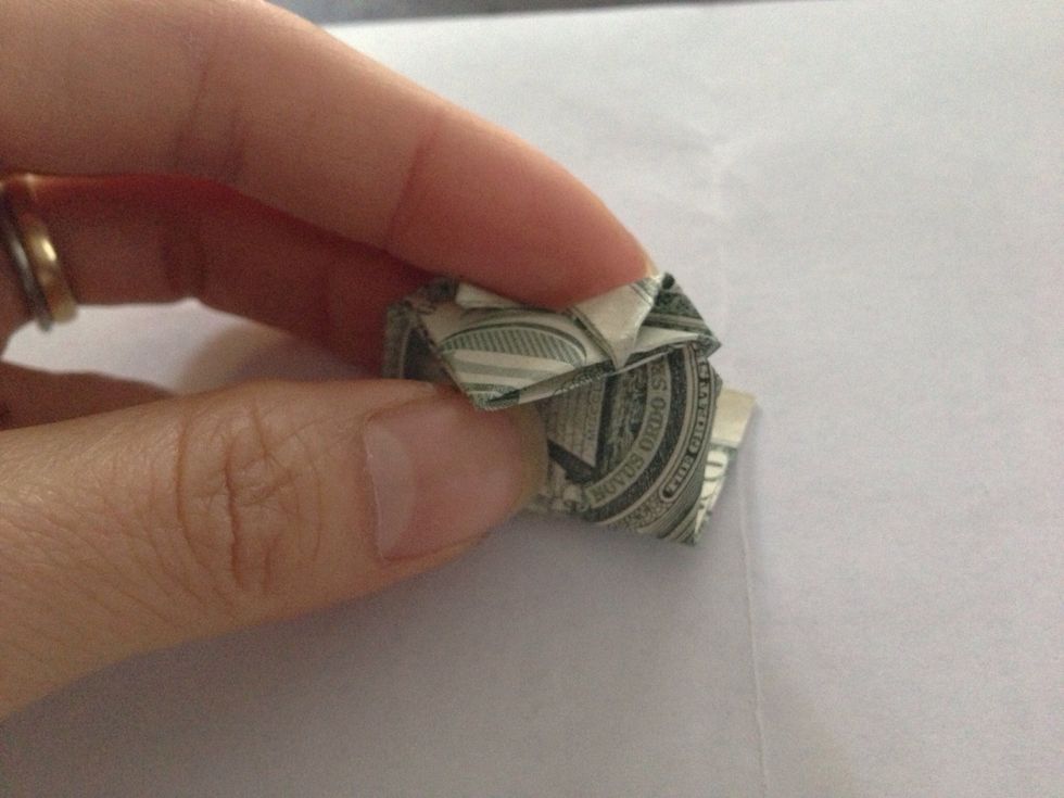 Insert the very tip into the slot. Note-the tips won't stay put because its so little.