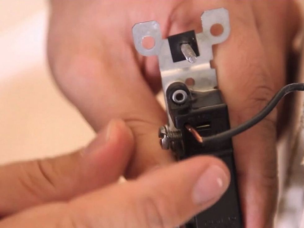 Insert the wires into the new switch. It doesn't matter which wires go into which hole.