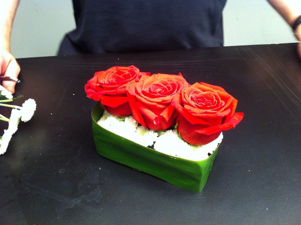 Insert three roses.