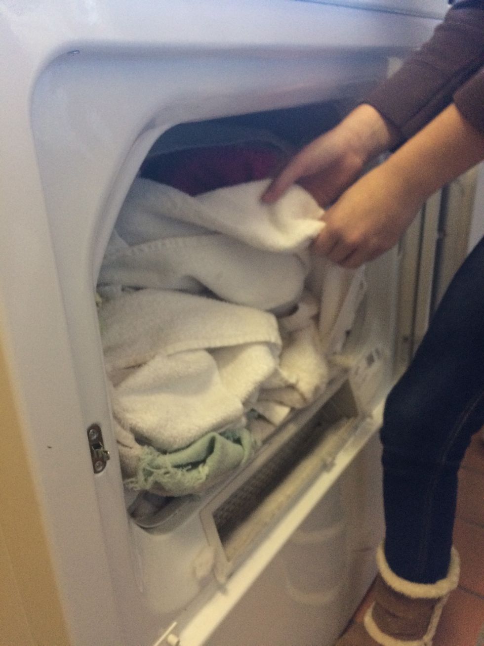 Insert wet clothes in dryer