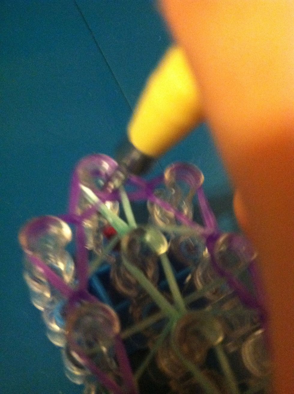 Insert your hook into the top where you ended looping