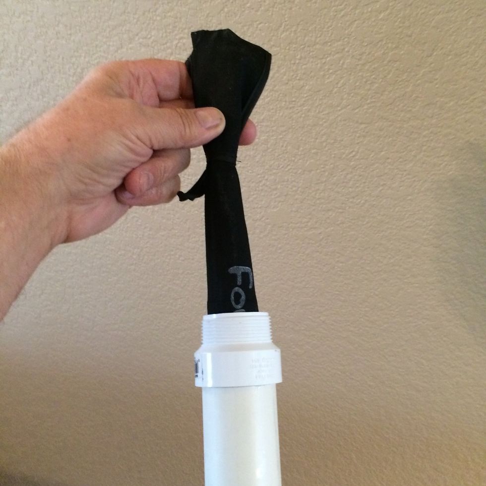 Insert your new Tenkara Fly Rod into your newly constructed rod holder. (Though not pictured, I cut a piece of foam rubber to fit inside the bottom end to prevent my rod from 'banging around' inside.)