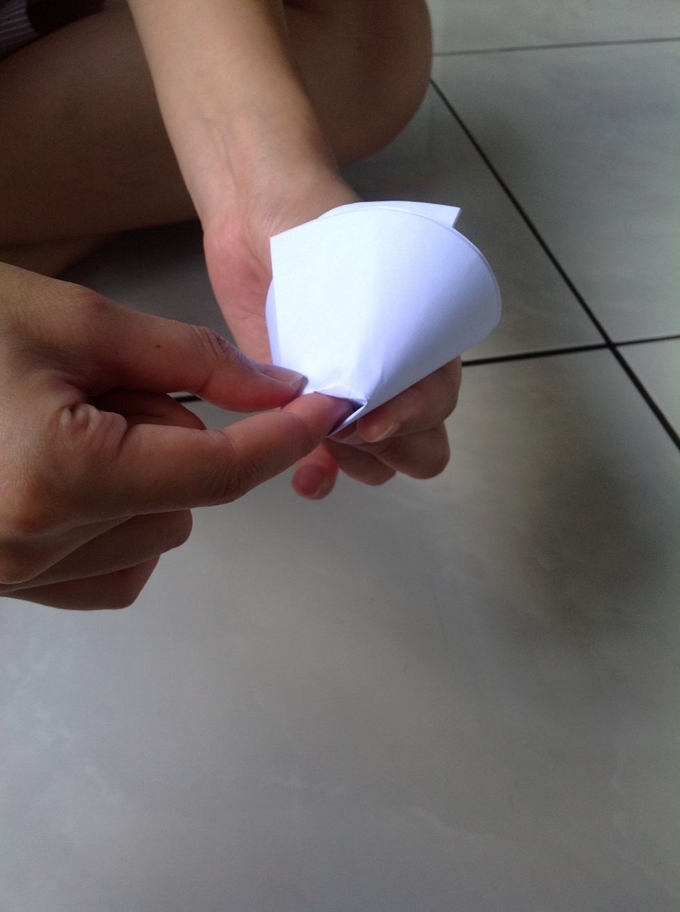 Insert your right index finger into the hole below