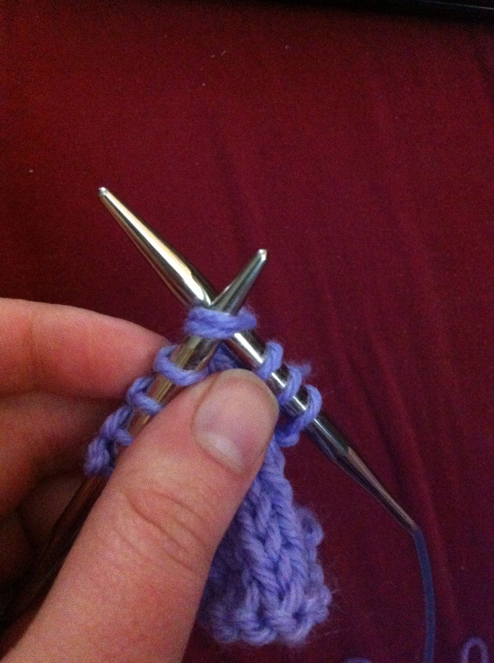 Insert your right needle through the first two stitches on the left needle from front to back as if to knit.