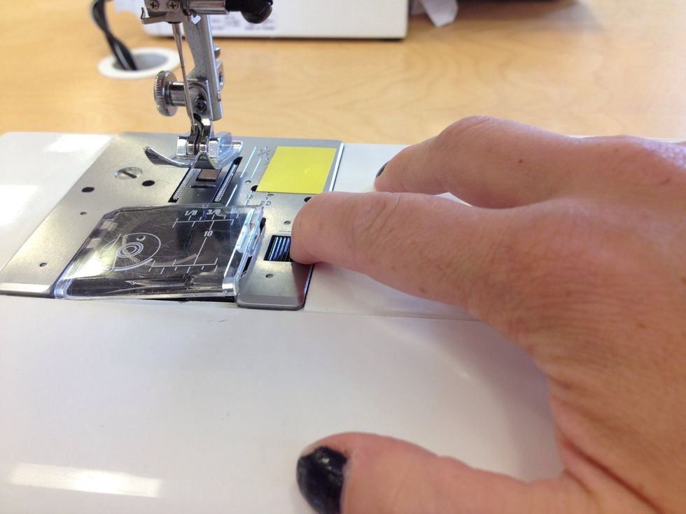 Inserting the bobbin.