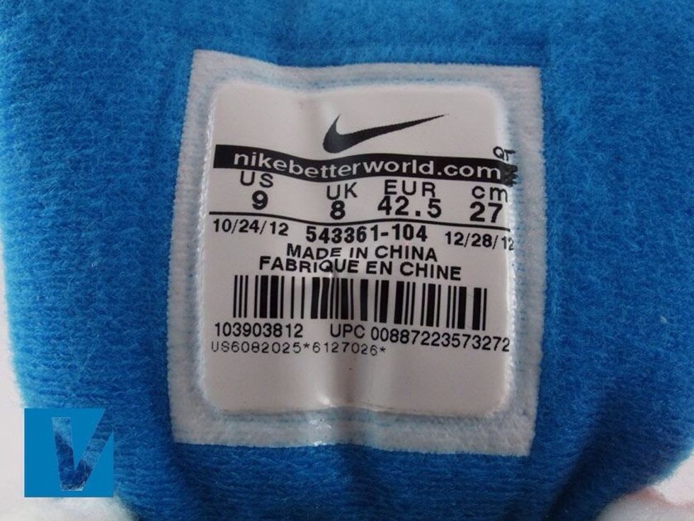 Inside label details vary depending on year, country of manufacture and style. Check that the tail of the Q in FABRIQUE starts inside the circle.