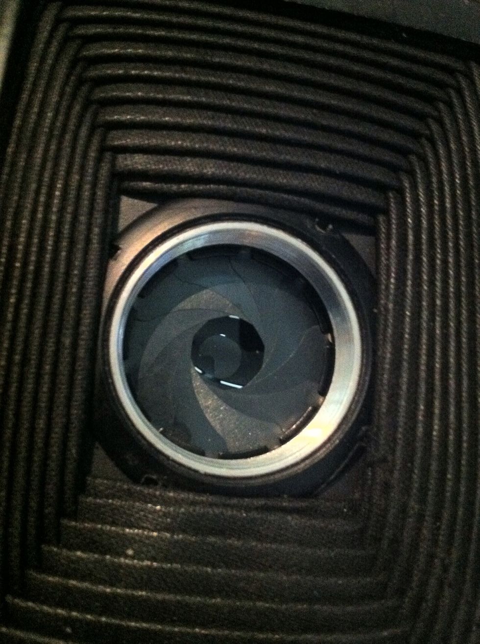 Inspect the shutter but DON'T TOUCH. If they are gummed up gently use a cleaner with a cotton bud but really if the shutter is working leave it in peace. These are horrible to pull apart . Hard to fix