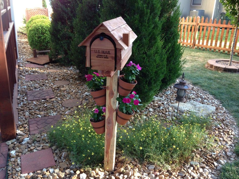 Install the mailbox and post according to box instructions. I forgot to take pics. I drove a metal stake into the ground and mounted the post to it. Then attached the box. No concrete required.