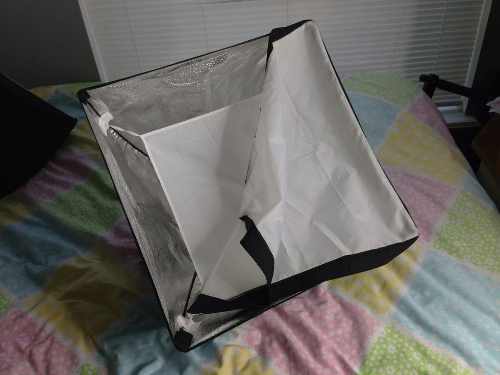 Install the outer diffuser, there is Velcro on the edges of the softbox to secure it in place.