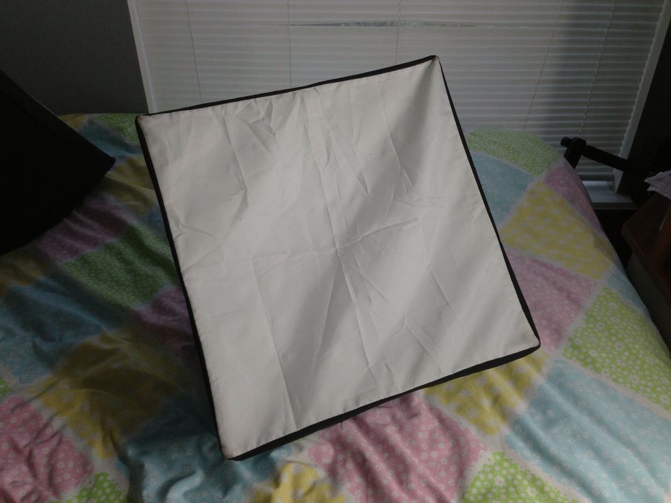 Install the outer diffuser, there is Velcro on the edges of the softbox to secure it in place.