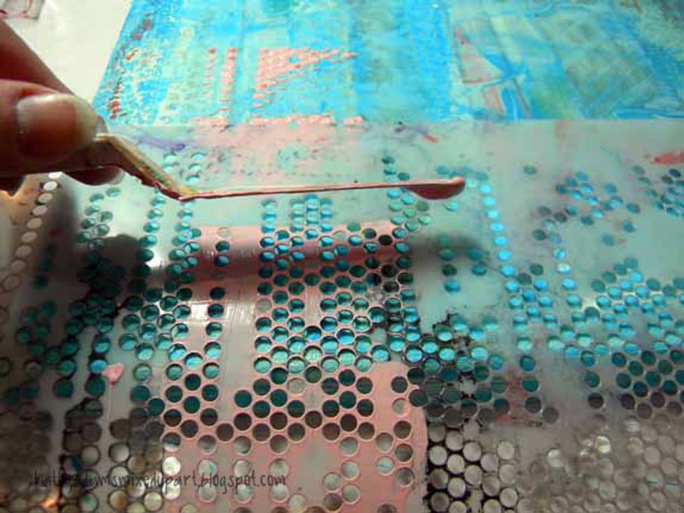 Instead, I spread the pink \u201cfrosting\u201d through a small circle stencil and let it dry.