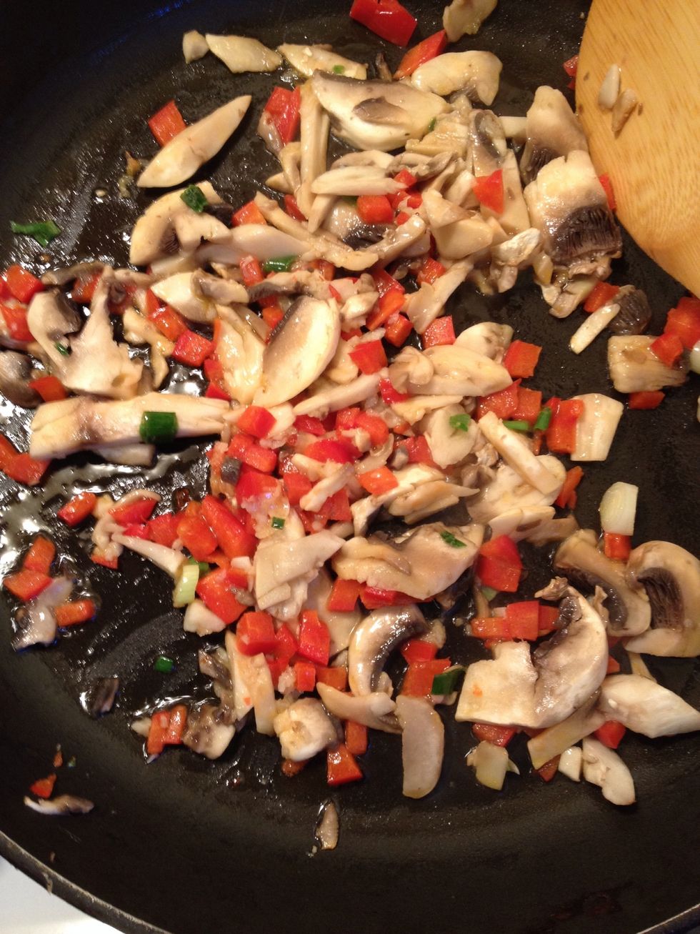 Instead of ground beef, I used mushroom this time. Saut\u00e9e all finely chopped mushrooms, garlic and red bell pepper with olive oil for about 2-3 minutes.