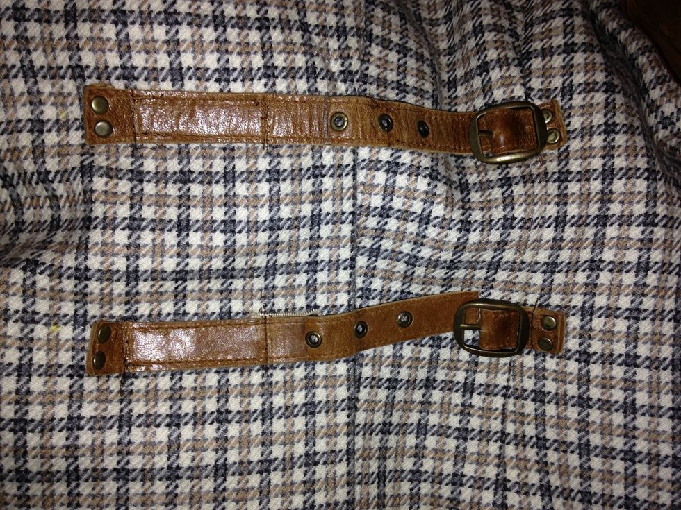 Instead of replacing the breast buttons, I took them off and replaced them altogether with straps off an old belt . I used an industrial sewing machine for this as my domestic wouldn't handle it!