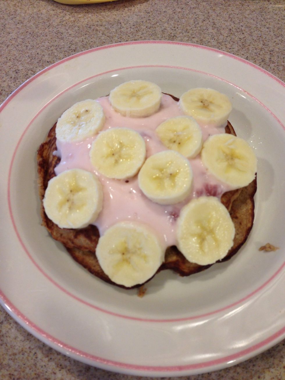 Instead of syrup or butter, I like using yogurt! So here I used strawberry yogurt as my spread and the remaining half of the banana to top it all off!