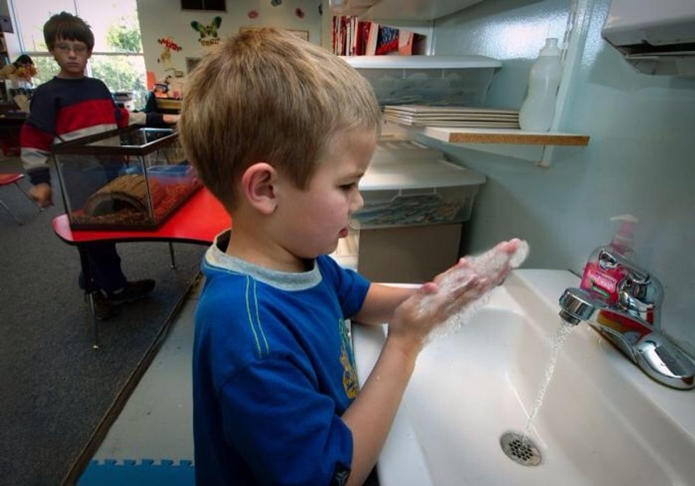 Instruct your child to wash their hands under soap and running water while counting to 20 before eating lunch.