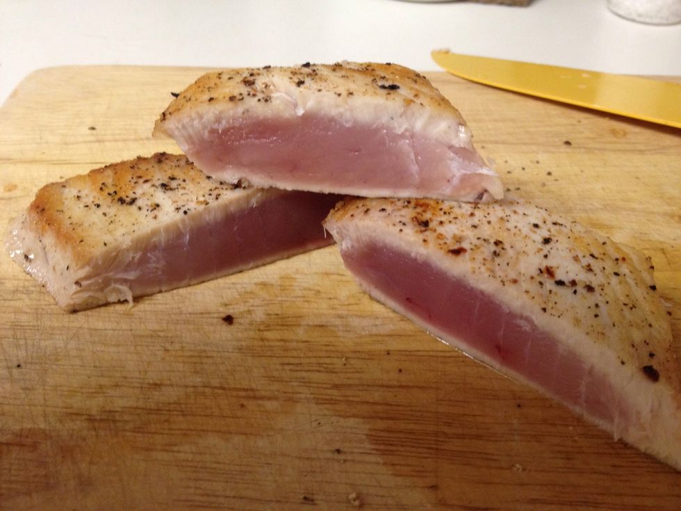 Internal view of the fish. This is in my opinion a perfect sear. Raw in the center and slightly cooked top and bottom.