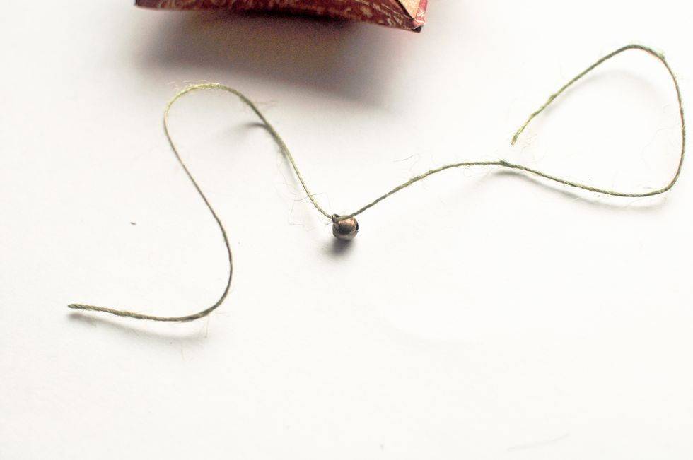 Into the cord we put a tiny bell